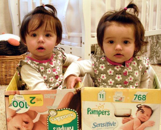 Kaitlyn and Ava crawled in empty diaper boxes this morning.